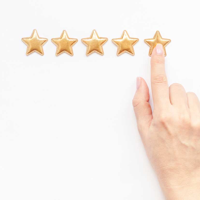 finger pointing to 5 stars for a review